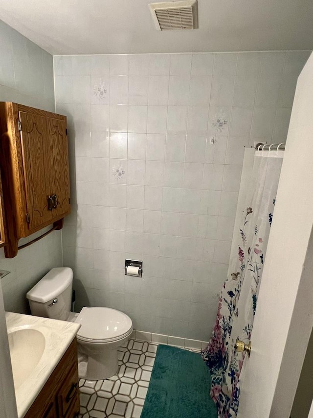 2350 Carnation Dr Unit 4, Crest Hill, IL 60403 - bathroom with vanity, a shower with curtain, tile walls, and tile patterned floors
