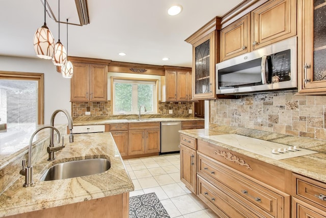 835 Tomawadee Ln, Park Ridge, IL 60068 - kitchen featuring stainless steel appliances, brown cabinetry, decorative light fixtures, decorative backsplash, and recessed lighting