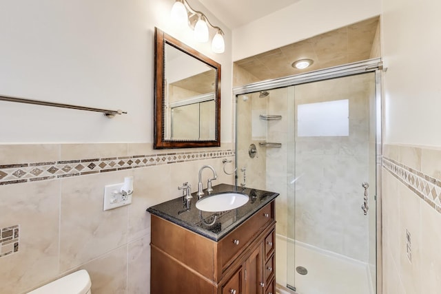 835 Tomawadee Ln, Park Ridge, IL 60068 - full bathroom featuring tile walls, vanity, a stall shower, and wainscoting