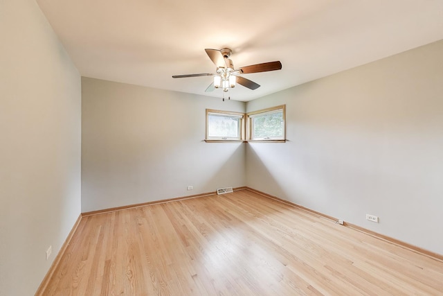 835 Tomawadee Ln, Park Ridge, IL 60068 - spare room featuring a ceiling fan and light wood finished floors