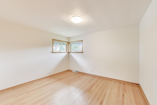 835 Tomawadee Ln, Park Ridge, IL 60068 - unfurnished room featuring light wood-type flooring and baseboards