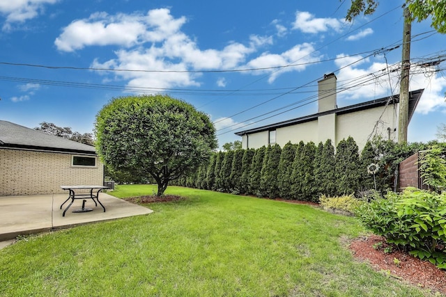 835 Tomawadee Ln, Park Ridge, IL 60068 - view of grassy yard with a patio area