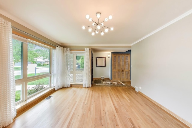835 Tomawadee Ln, Park Ridge, IL 60068 - empty room with a chandelier, light wood-style flooring, and crown molding