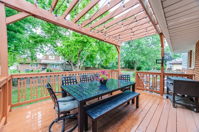 7613 Stratford Pl, Darien, IL 60561 - deck featuring outdoor dining space, a pergola, and a fenced backyard
