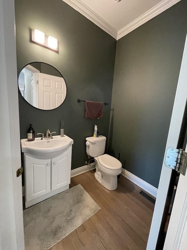 412 Merry Oaks Rd, Streamwood, IL 60107 - bathroom with vanity, wood finished floors, and crown molding
