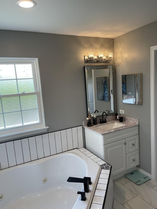 412 Merry Oaks Rd, Streamwood, IL 60107 - full bathroom with vanity, a tub with jets, and marble look tile flooring