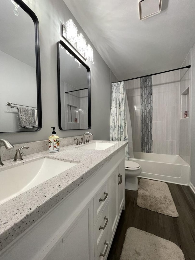 412 Merry Oaks Rd, Streamwood, IL 60107 - bathroom with double vanity, wood finished floors, and shower / tub combo with curtain