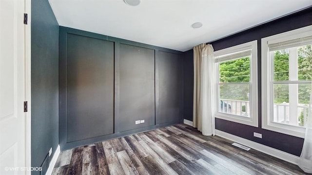 137 Forest Ave, Fox Lake, IL 60020 - unfurnished room featuring wood finished floors and baseboards