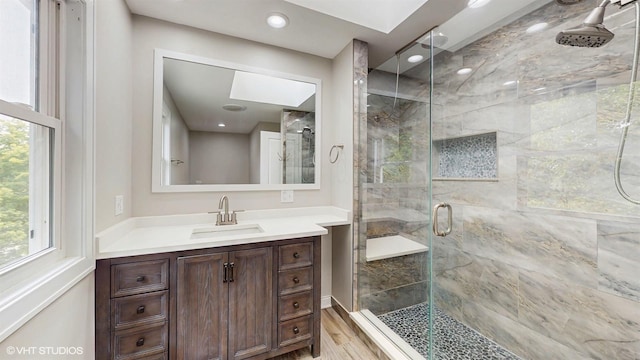 137 Forest Ave, Fox Lake, IL 60020 - bathroom with a stall shower, vanity, wood finished floors, and recessed lighting