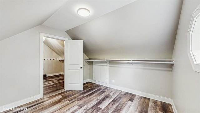 137 Forest Ave, Fox Lake, IL 60020 - spacious closet featuring wood finished floors and vaulted ceiling
