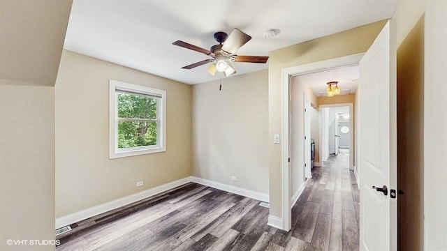 137 Forest Ave, Fox Lake, IL 60020 - spare room with dark wood-style floors and ceiling fan