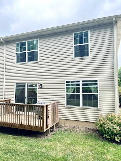 7031 Country Club Hills Dr, Fox Lake, IL 60020 - back of property featuring a deck and a yard