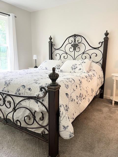 7031 Country Club Hills Dr, Fox Lake, IL 60020 - carpeted bedroom featuring baseboards