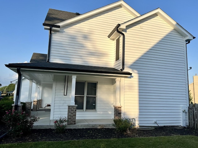 2472 Worthington Dr, Aurora, IL 60506 - view of side of property featuring a porch and a shingled roof