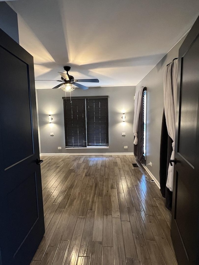 2472 Worthington Dr, Aurora, IL 60506 - unfurnished room with ceiling fan and dark wood-style floors