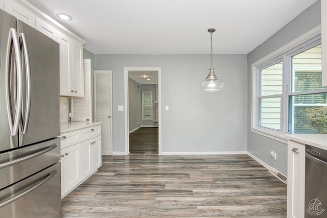 28426 W Lindbergh Dr, Barrington, IL 60010 - kitchen featuring stainless steel appliances, light wood-style floors, white cabinetry, and light countertops