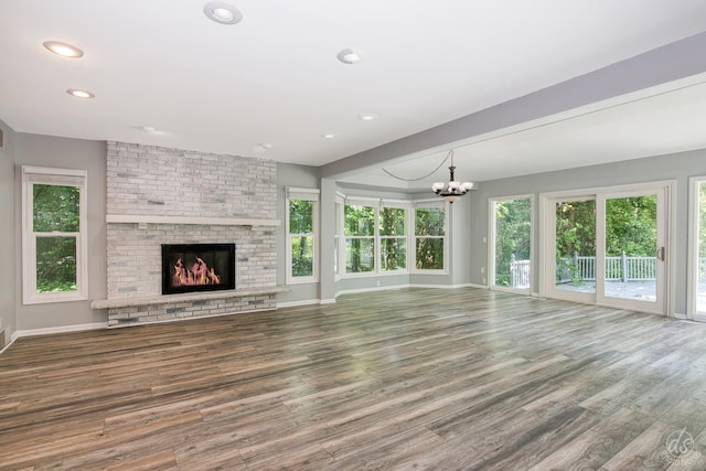 28426 W Lindbergh Dr, Barrington, IL 60010 - unfurnished living room featuring a chandelier, wood finished floors, a fireplace, and recessed lighting