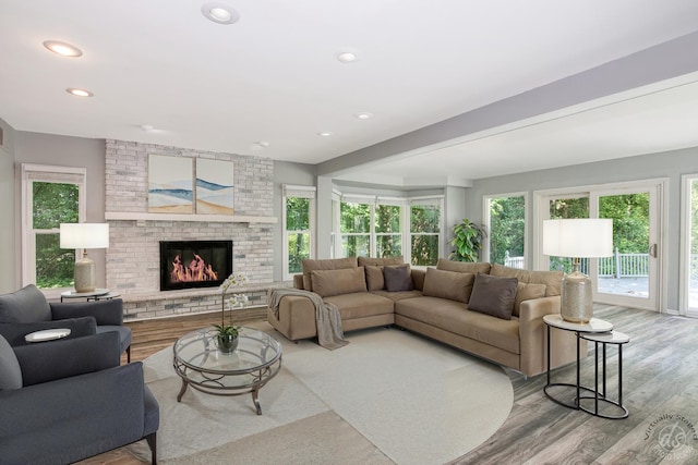 28426 W Lindbergh Dr, Barrington, IL 60010 - living area with wood finished floors, a brick fireplace, and recessed lighting