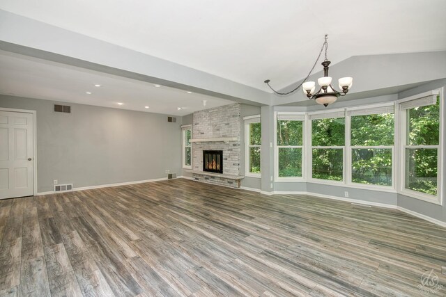 28426 W Lindbergh Dr, Barrington, IL 60010 - unfurnished living room featuring a chandelier, wood finished floors, vaulted ceiling, recessed lighting, and a large fireplace
