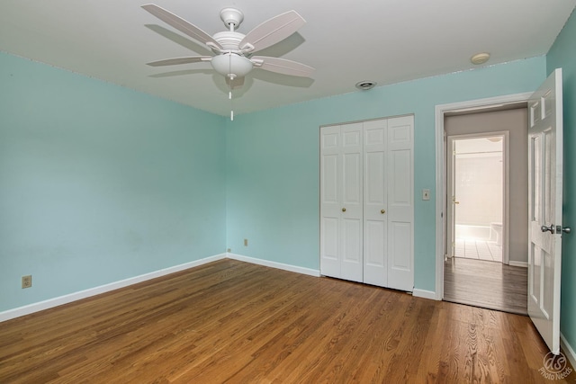 28426 W Lindbergh Dr, Barrington, IL 60010 - unfurnished bedroom featuring wood finished floors, a closet, and a ceiling fan