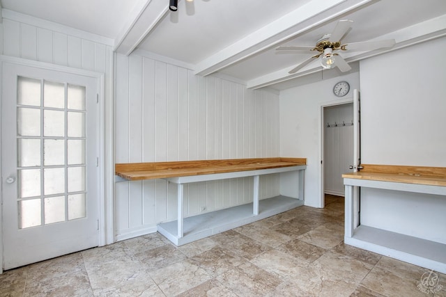 28426 W Lindbergh Dr, Barrington, IL 60010 - mudroom with ceiling fan, beamed ceiling, plenty of natural light, stone finish floors, and wooden walls