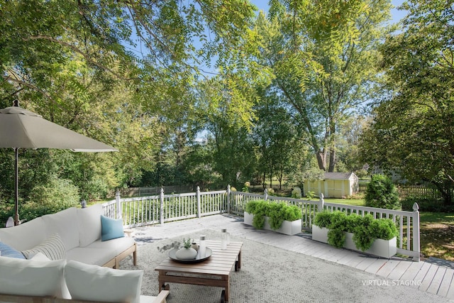 28426 W Lindbergh Dr, Barrington, IL 60010 - view of patio with an outdoor living space, a storage shed, a deck, and view of scattered trees