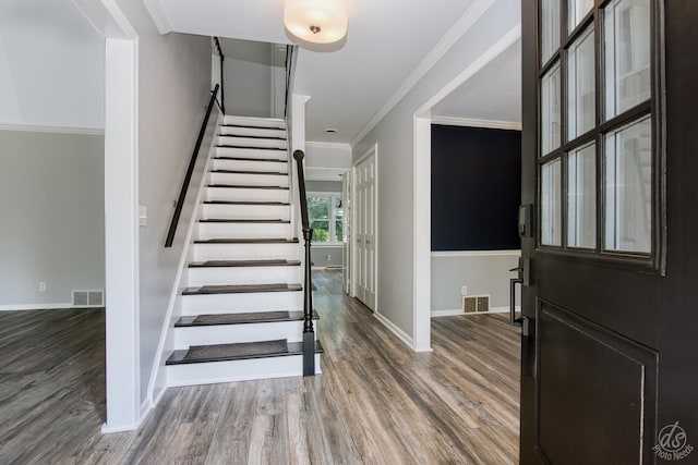 28426 W Lindbergh Dr, Barrington, IL 60010 - entryway with wood finished floors, stairs, and crown molding