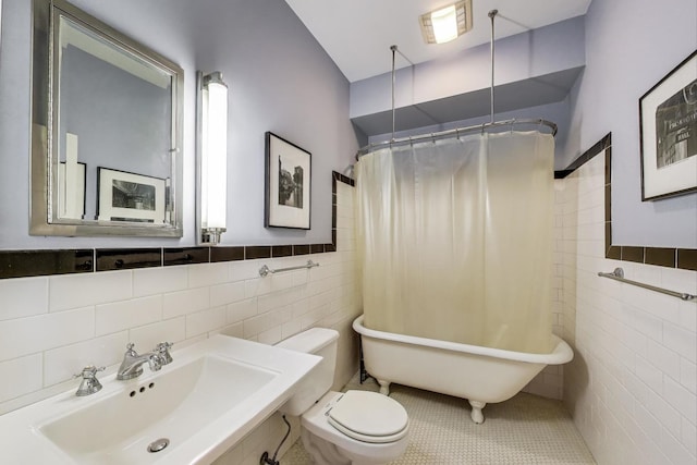 3822 N Claremont Ave, Chicago, IL 60618 - full bathroom with tile walls and tile patterned floors