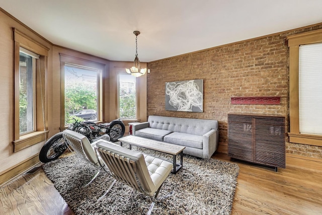 3822 N Claremont Ave, Chicago, IL 60618 - living room featuring a chandelier and wood finished floors