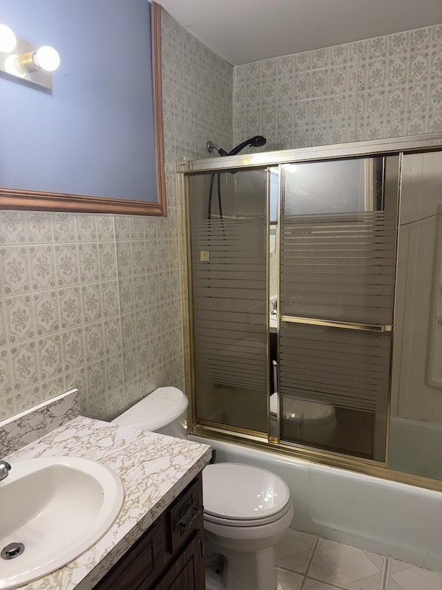 308 Old Indian Trl, Aurora, IL 60506 - full bath with vanity, bath / shower combo with glass door, tile patterned flooring, and wallpapered walls