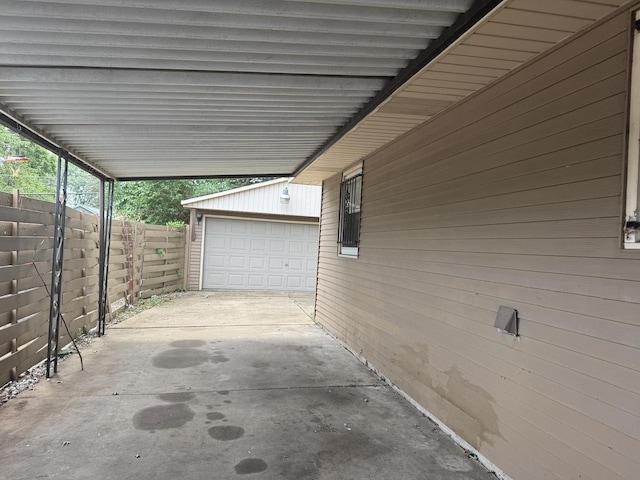 308 Old Indian Trl, Aurora, IL 60506 - garage featuring a carport and concrete driveway