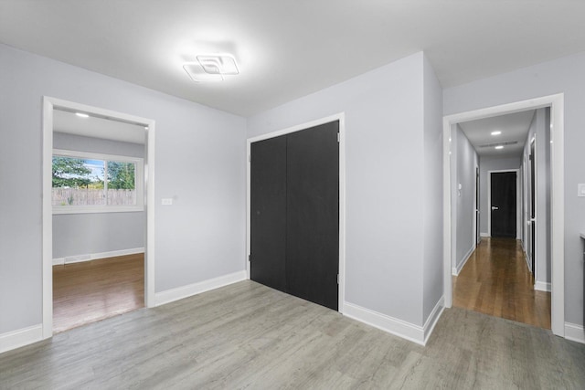 49 Stacy Ct, Glenview, IL 60025 - unfurnished bedroom with wood finished floors and a closet