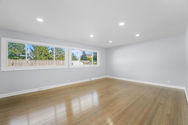 49 Stacy Ct, Glenview, IL 60025 - spare room with healthy amount of natural light, light wood-style floors, and recessed lighting