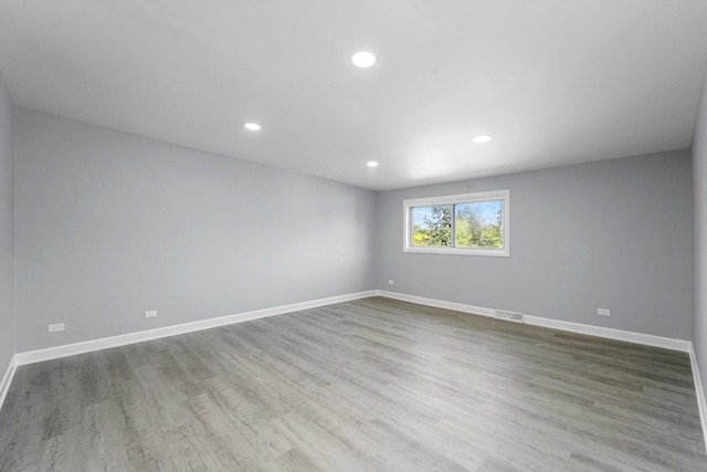 49 Stacy Ct, Glenview, IL 60025 - empty room featuring wood finished floors and recessed lighting