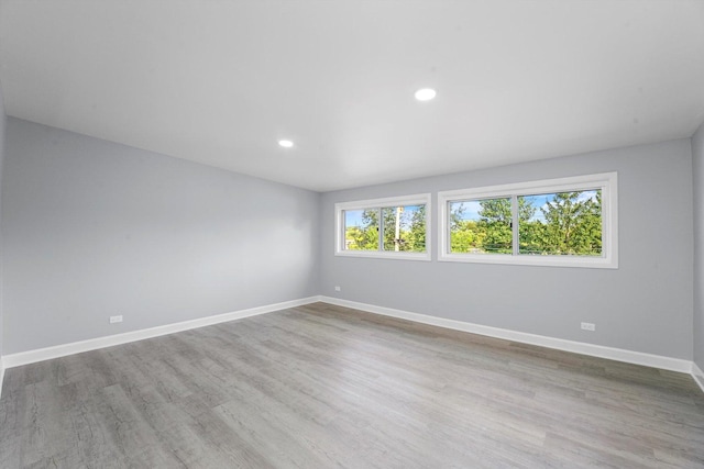 49 Stacy Ct, Glenview, IL 60025 - unfurnished room with wood finished floors and recessed lighting