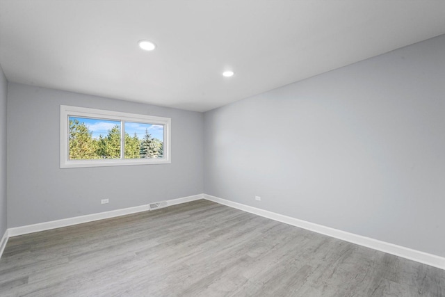 49 Stacy Ct, Glenview, IL 60025 - unfurnished room featuring wood finished floors and recessed lighting