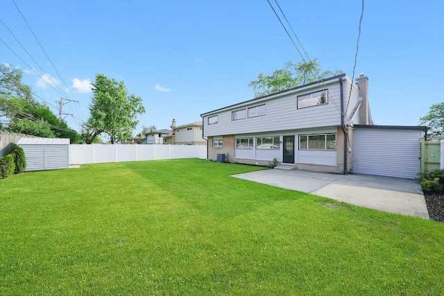 49 Stacy Ct, Glenview, IL 60025 - back of property with a chimney and a patio area