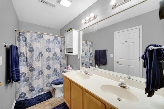4576 Hilltop Dr, Loves Park, IL 61111 - full bathroom with double vanity and curtained shower