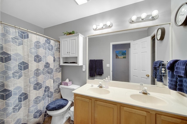 4576 Hilltop Dr, Loves Park, IL 61111 - bathroom featuring double vanity and curtained shower