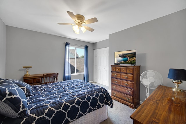 4576 Hilltop Dr, Loves Park, IL 61111 - carpeted bedroom with a closet and a ceiling fan