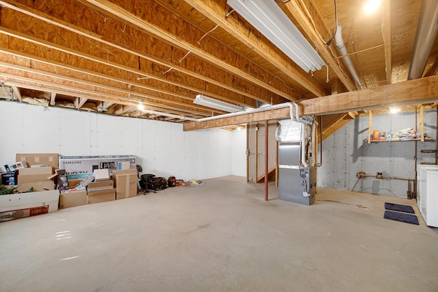 4576 Hilltop Dr, Loves Park, IL 61111 - unfinished below grade area with heating unit and washer / dryer