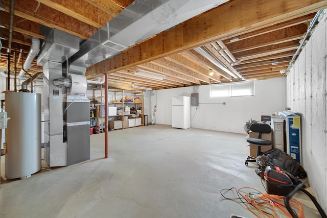 4576 Hilltop Dr, Loves Park, IL 61111 - basement featuring gas water heater, freestanding refrigerator, and heating unit