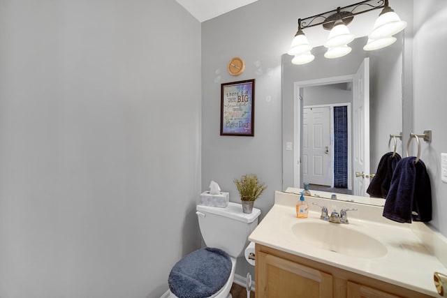 4576 Hilltop Dr, Loves Park, IL 61111 - bathroom featuring toilet and vanity