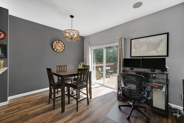 4576 Hilltop Dr, Loves Park, IL 61111 - dining area featuring wood finished floors, a chandelier, and an office area