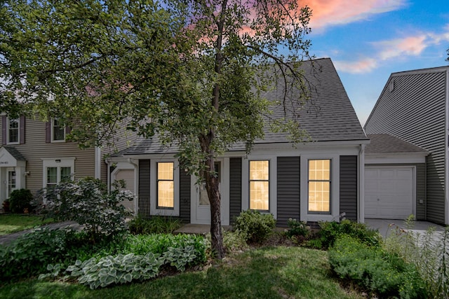 29W409 White Oak Dr, Warrenville, IL 60555 - view of front of house featuring a shingled roof, a garage, and concrete driveway