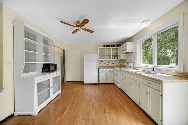 29W409 White Oak Dr, Warrenville, IL 60555 - kitchen featuring white appliances, open shelves, ceiling fan, light wood-style flooring, and light countertops