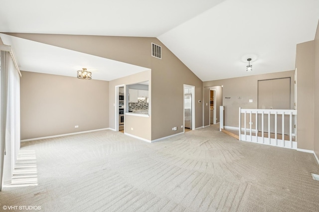 1234 Ballantrae Pl Unit D, Mundelein, IL 60060 - empty room with lofted ceiling and light colored carpet