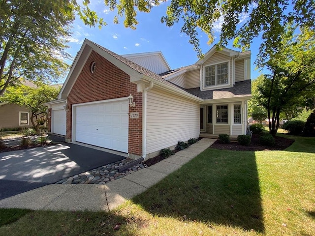 1920 Waverly Cir, Saint Charles, IL 60174 - traditional-style house featuring an attached garage, a front lawn, brick siding, asphalt driveway, and roof with shingles