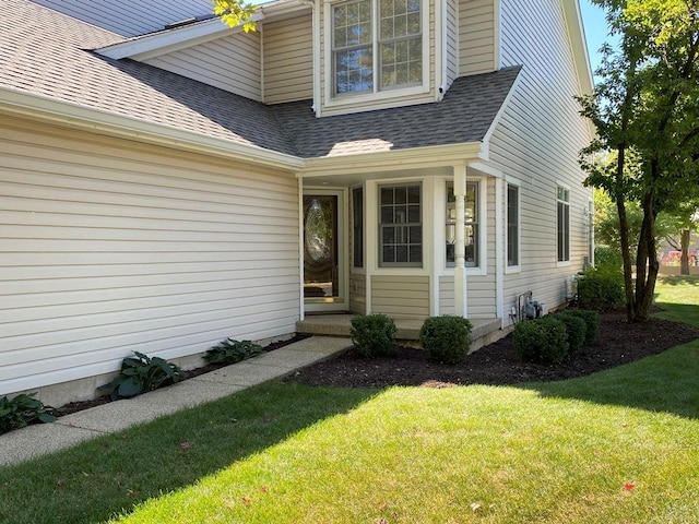 1920 Waverly Cir, Saint Charles, IL 60174 - doorway to property featuring a shingled roof and a lawn