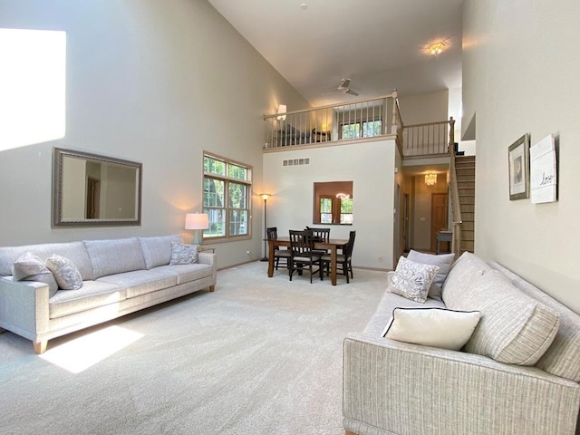1920 Waverly Cir, Saint Charles, IL 60174 - living room featuring a towering ceiling, carpet flooring, and ceiling fan